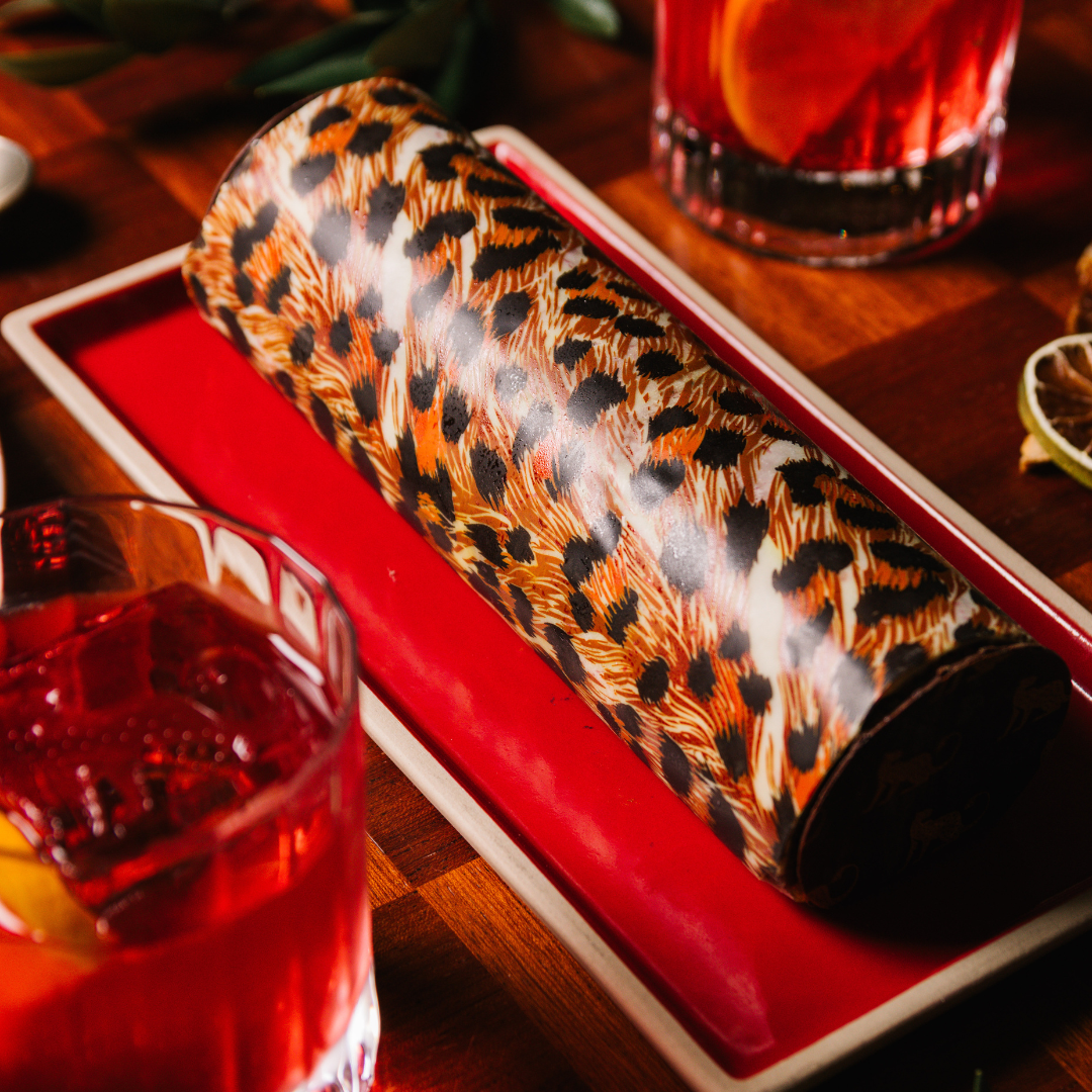 Il Gattopardo Mayfair’s Christmas Tronchetto, a dark chocolate and Sicilian orange Yule log wrapped in signature leopard print.